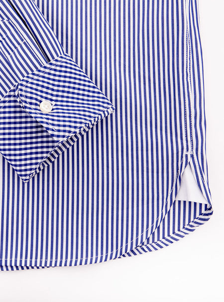 Flat lay of men's long sleeved shirt with navy blue thin stripe and gingham cuff and collar pattern on the inside. Made with 100% cotton in Thomas Mason fabric.